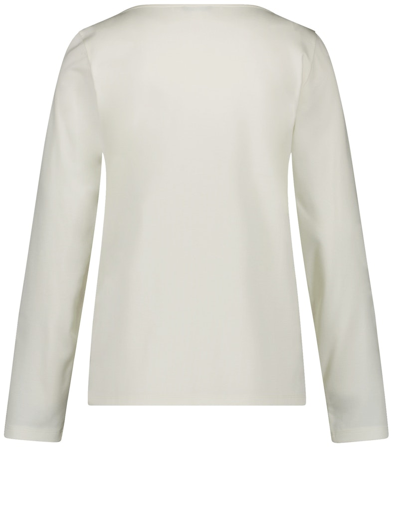 חולצה מנומרת בנצנוץ זהב