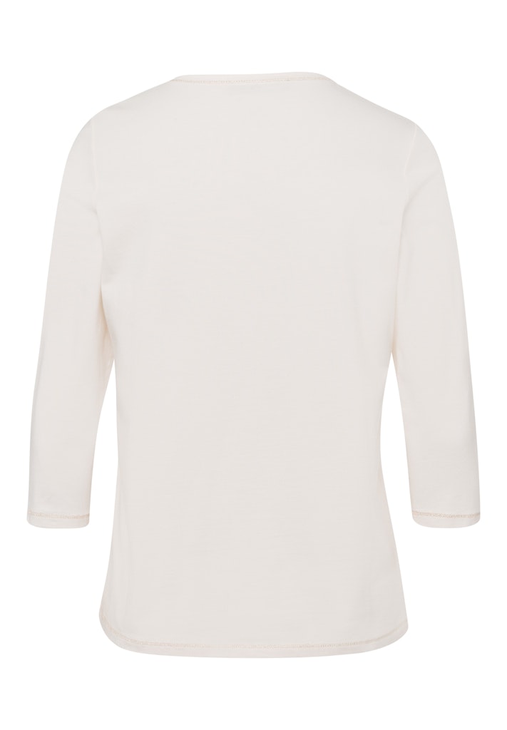 חולצה לבנה עם הדפס גרפי בצבעים חמים