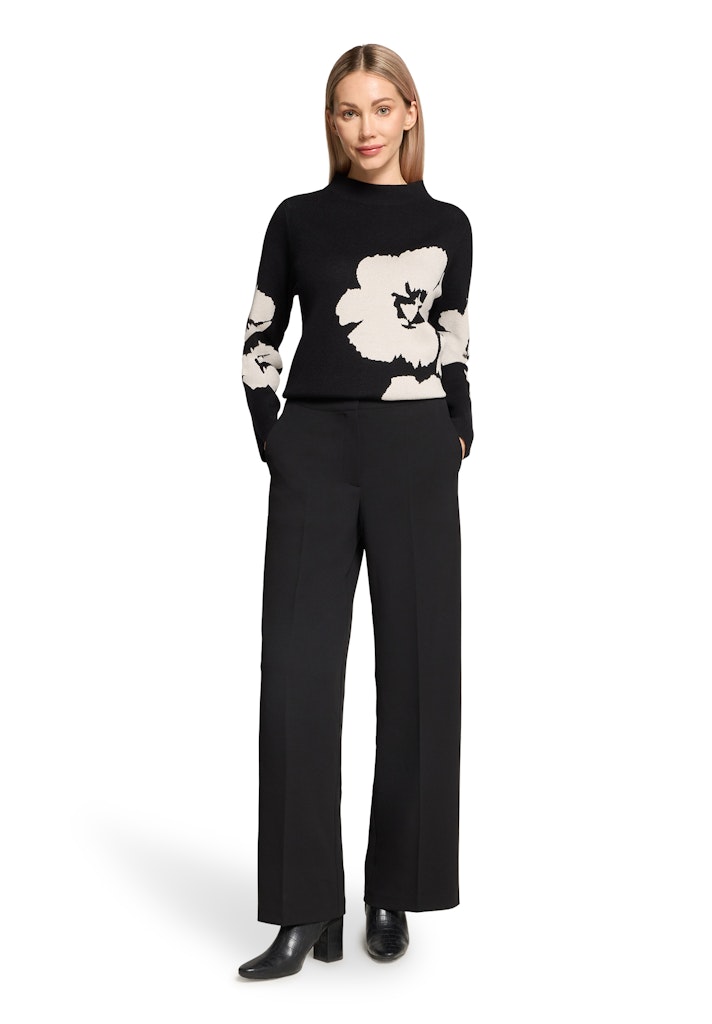 סריג גולף שחור עם הדפס פרחוני